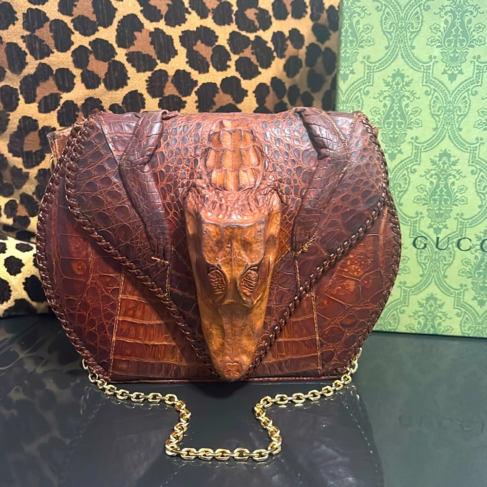 Genuine alligator bag with gold tonned metal strap